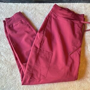 Red High-Waisted Track Pants with Stretchy Fabric